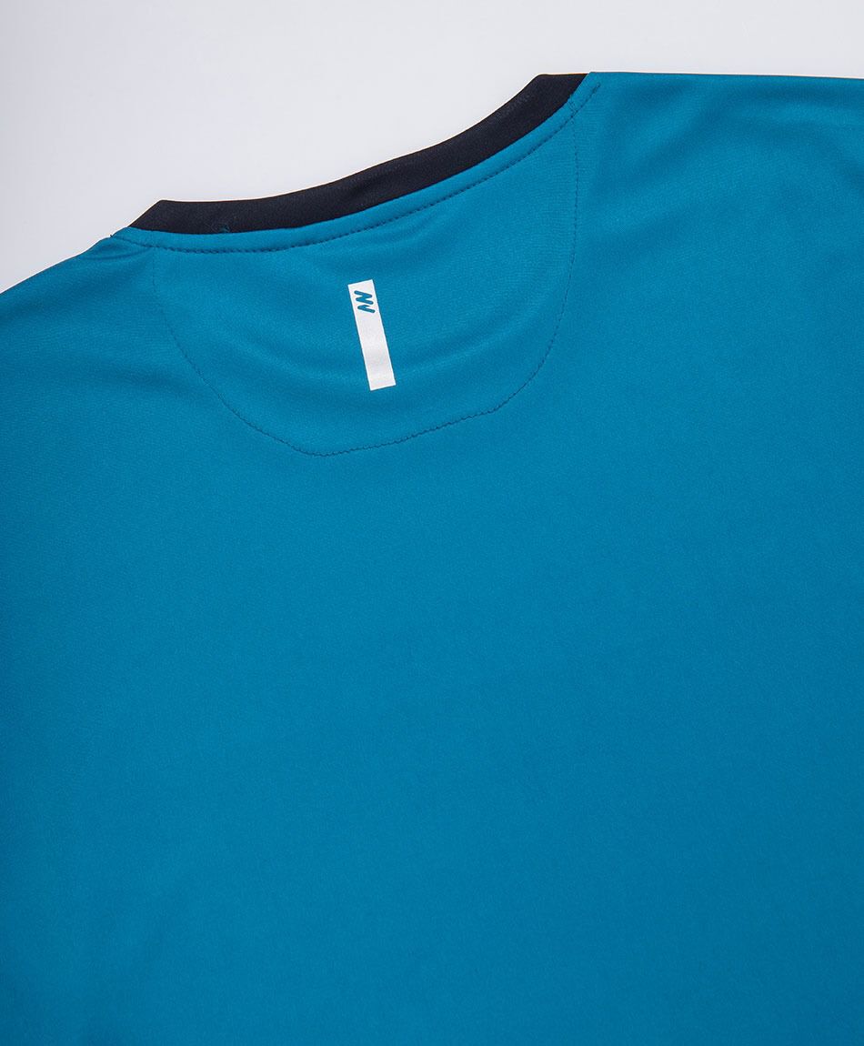 Polera deportiva hombre l&iacute;neas turquesa