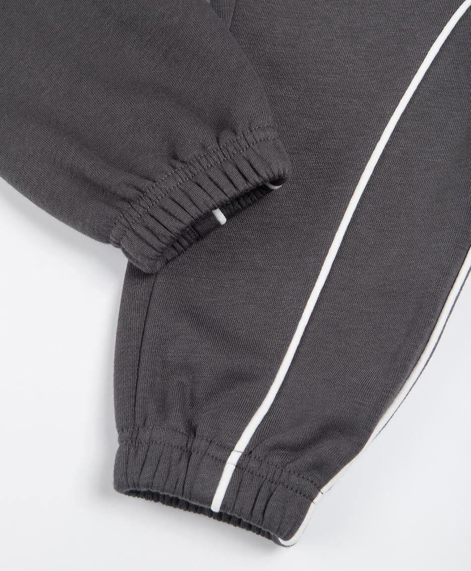 Pantal&oacute;n buzo ni&ntilde;o l&iacute;neas blancas
