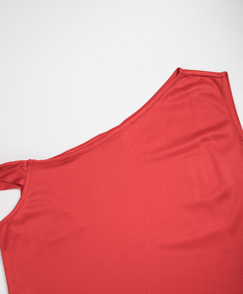 Polera mujer asim&eacute;trica lazo roja