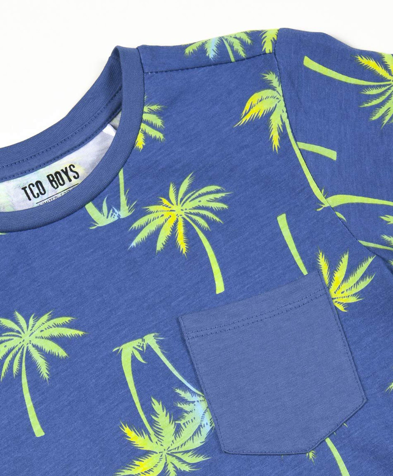 Polera niño palmeras bolsillo Polera niño palmeras bolsillo