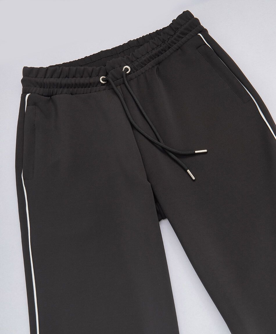 Pantal&oacute;n deportivo mujer l&iacute;neas blancas