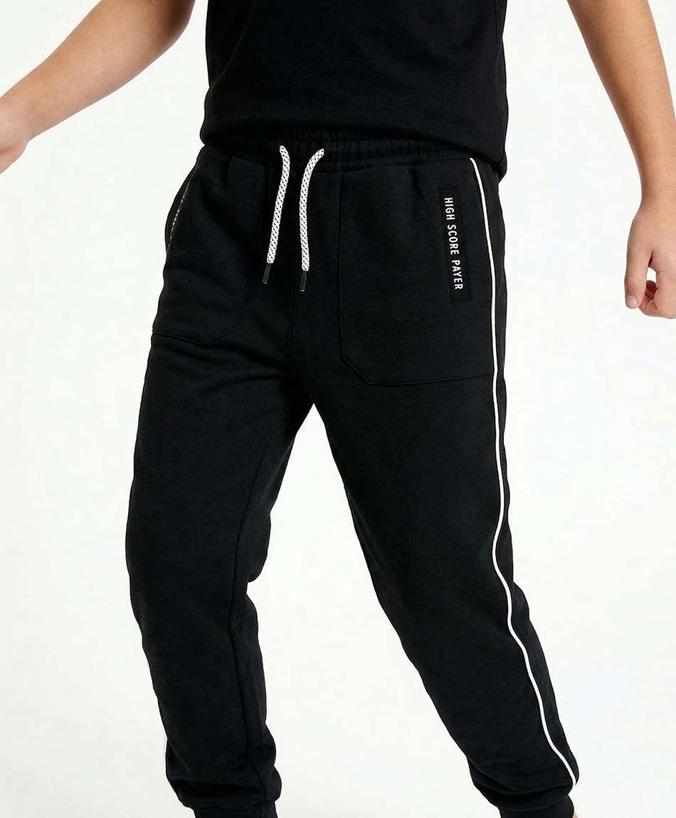 Pantal&oacute;n buzo ni&ntilde;o l&iacute;nea blanca