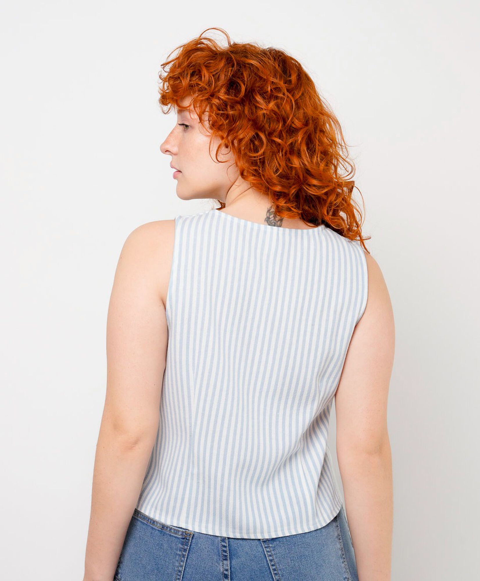 Blusa mujer líneas celeste sin mangas Blusa mujer líneas celeste sin mangas