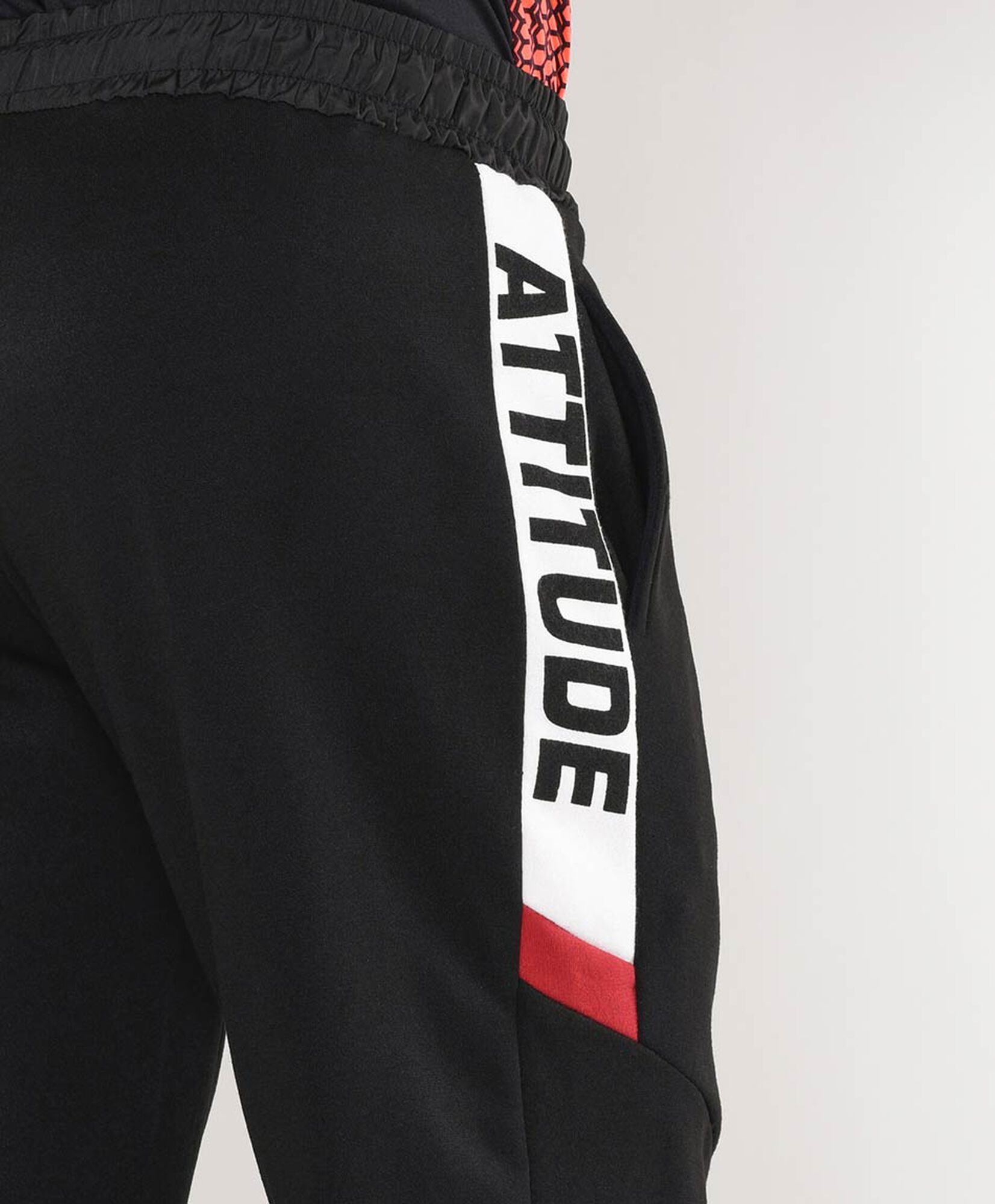Pantalón de buzo hombre deportivo texto lateral Pantalón de buzo hombre deportivo texto lateral