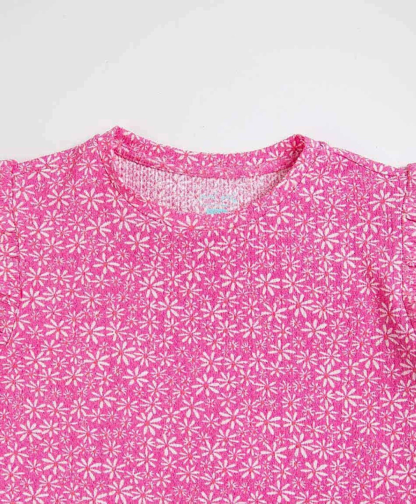 Polera niña florcitas vuelos Polera niña florcitas vuelos