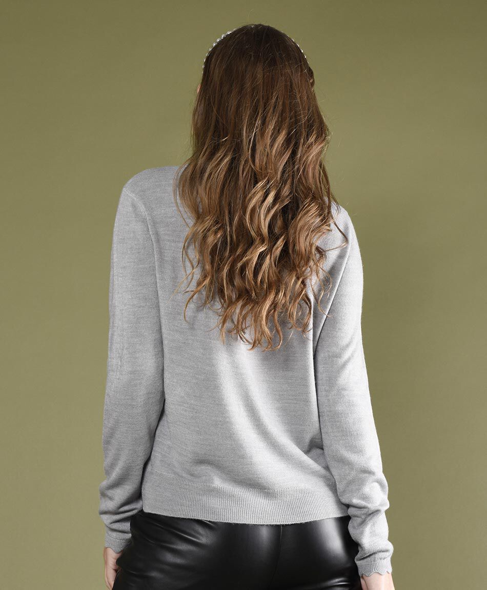 Sweater detalle blondas