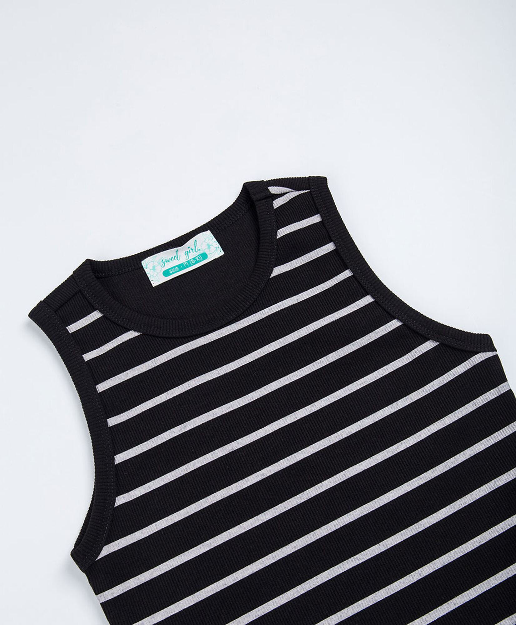 Polera niña líneas negra Polera niña líneas negra