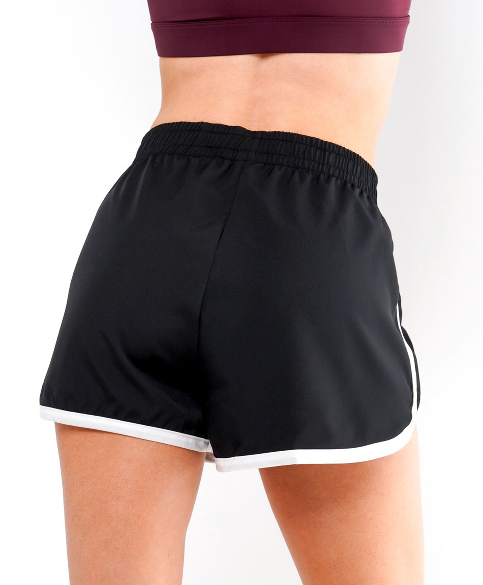 Short deportivo mujer líneas blancas Short deportivo mujer líneas blancas