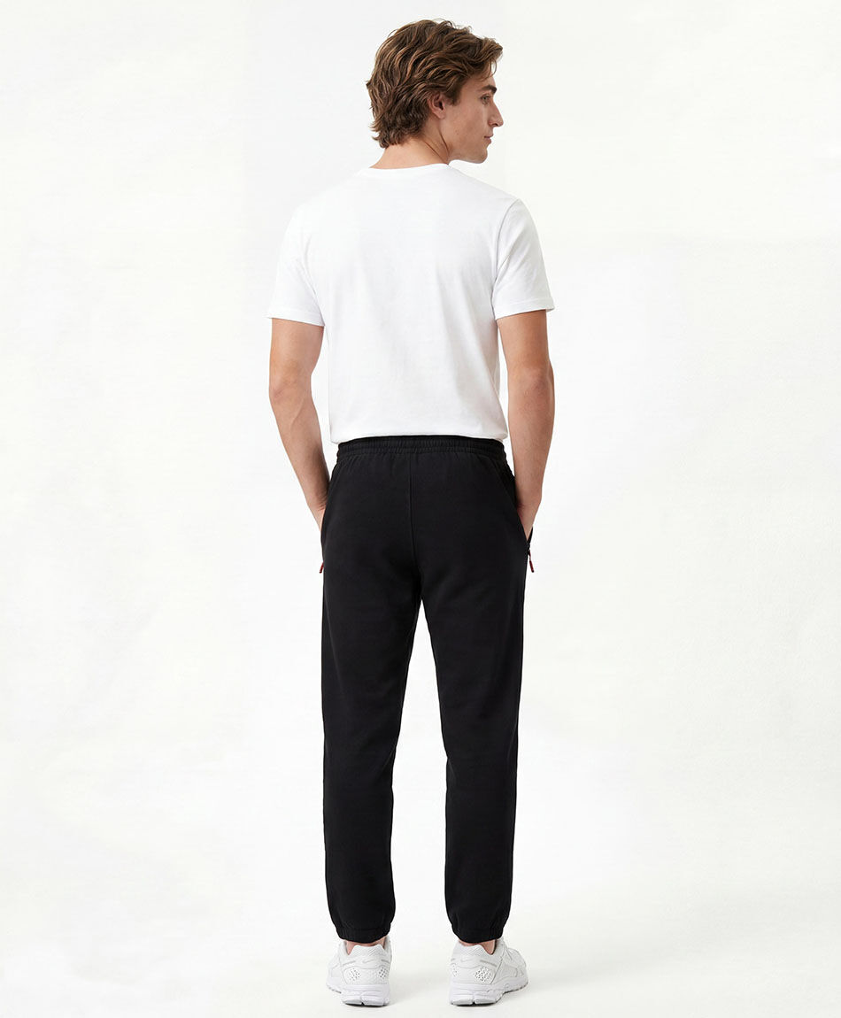 Pantal&oacute;n deportivo hombre negro cierres