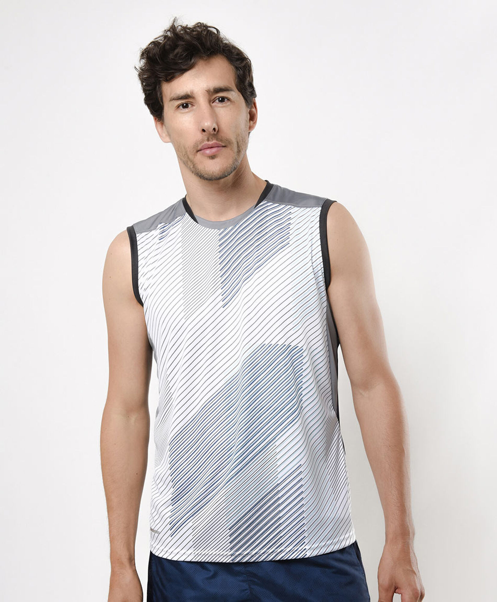 Polera deportiva hombre líneas sin mangas Polera deportiva hombre líneas sin mangas