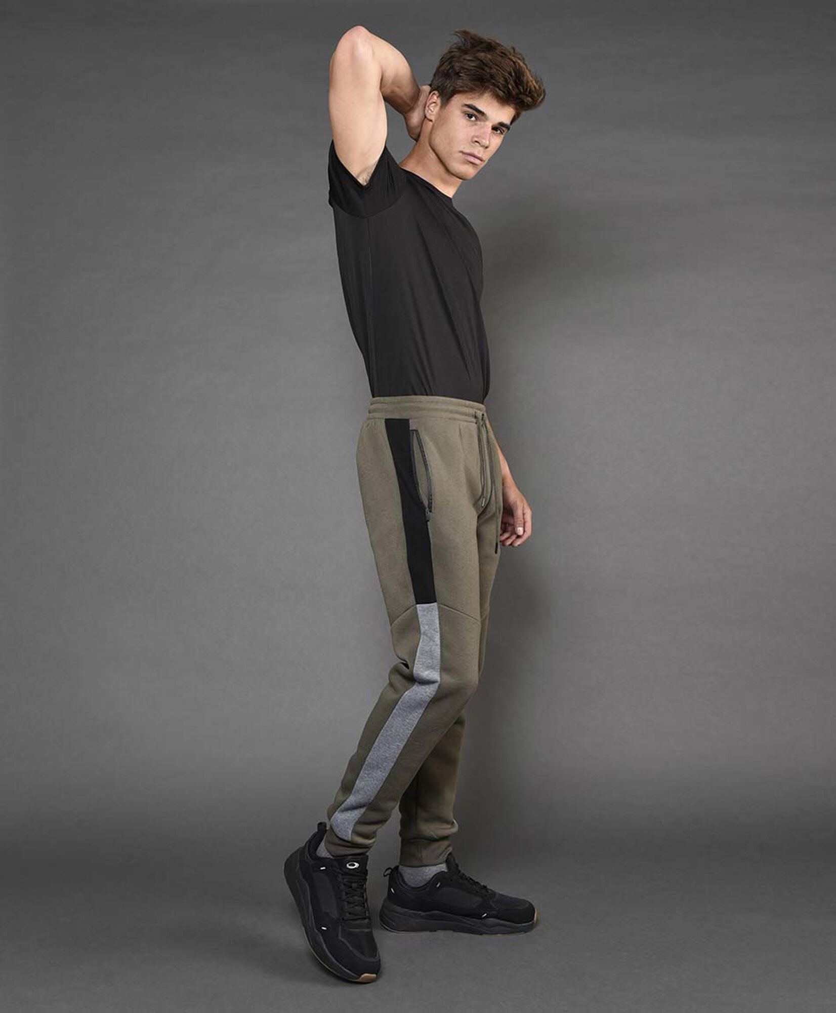 Pantalón de buzo hombre franja bicolor lateral Pantalón de buzo hombre franja bicolor lateral