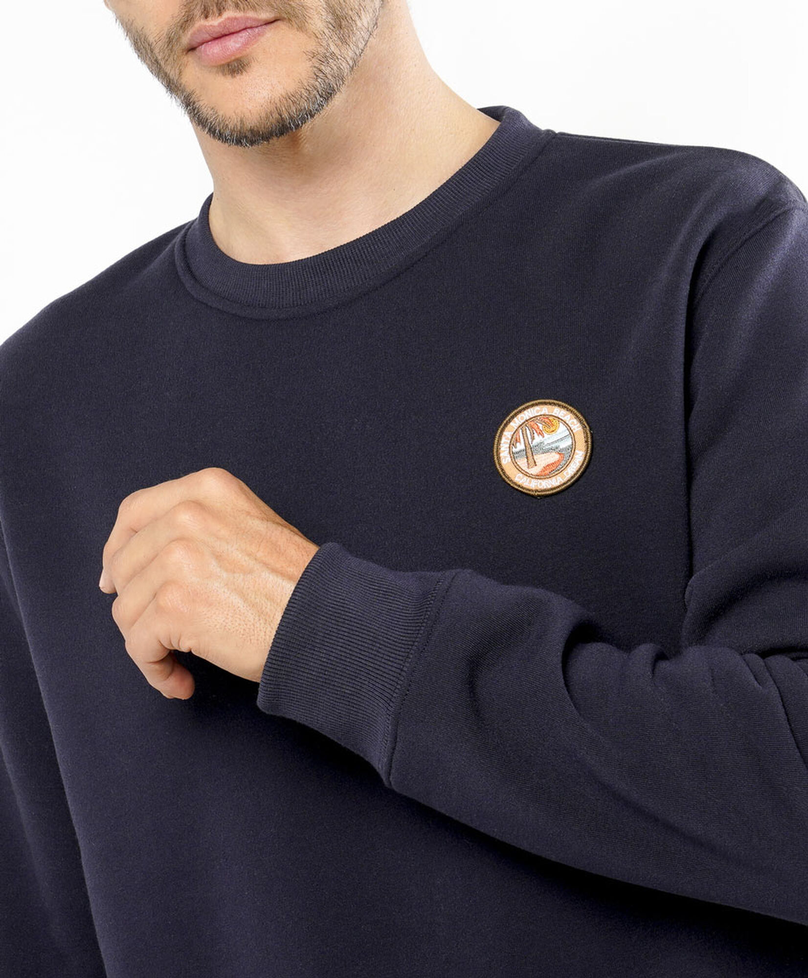 Polerón hombre liso mini bordado Polerón hombre liso mini bordado