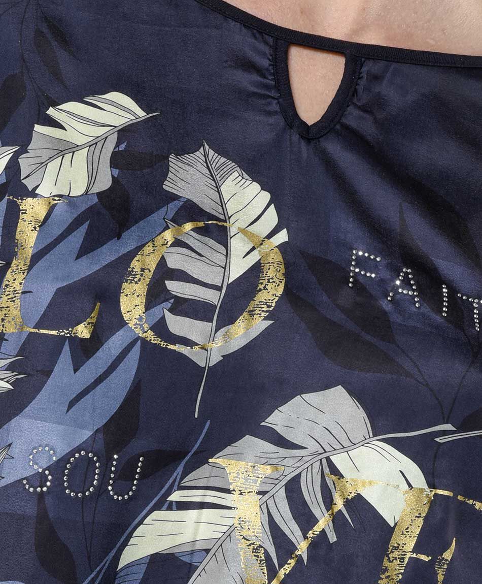 Polera mujer hojas y tachitas