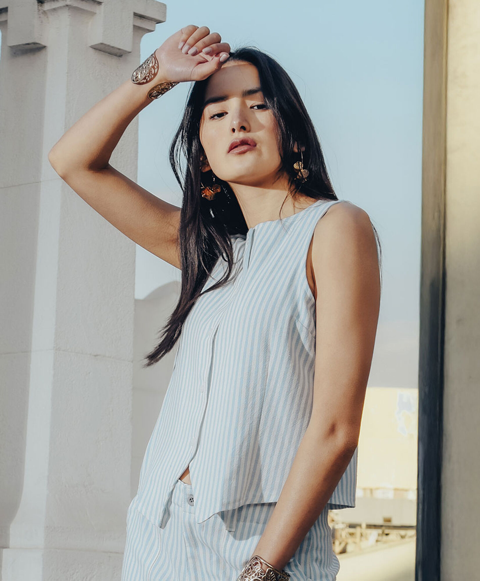 Blusa mujer líneas celeste sin mangas Blusa mujer líneas celeste sin mangas