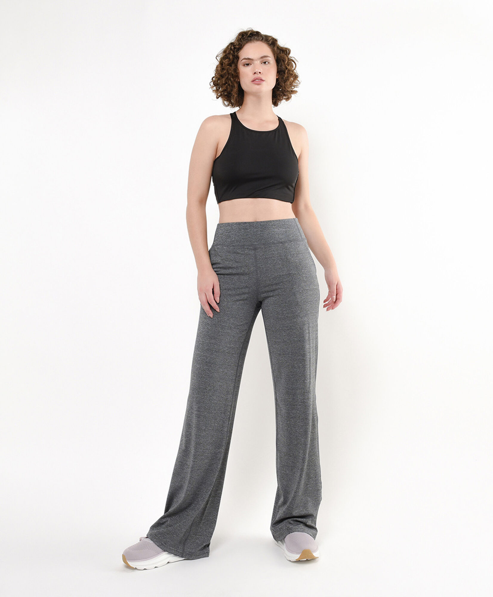 Calza deportiva mujer flare bolsillos TRICOT