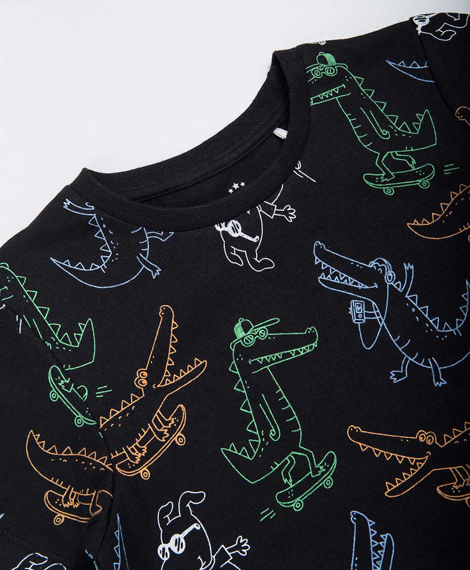 Polera bebé dinosaurios colores Polera bebé dinosaurios colores