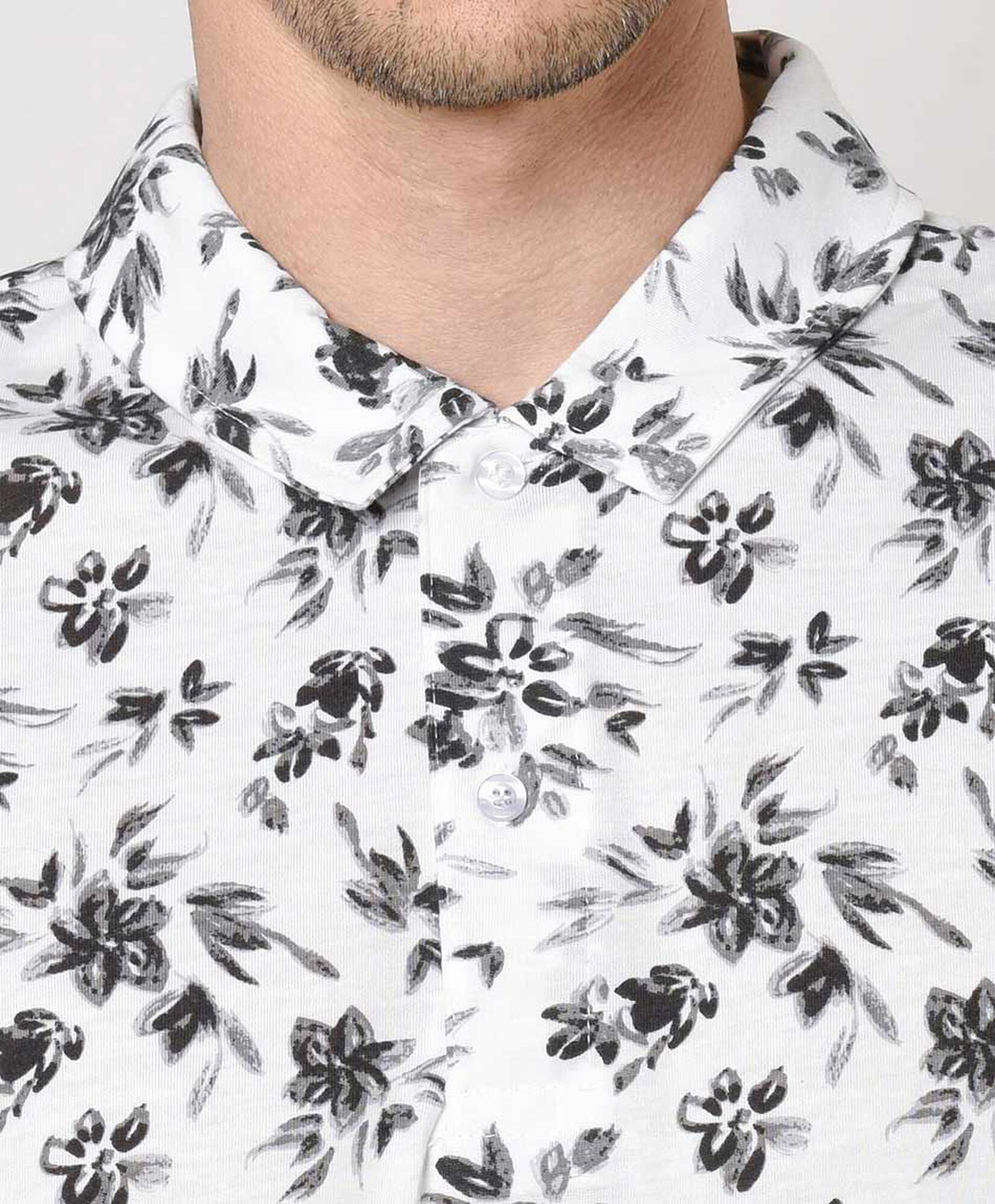 Polera hombre flores cuello piqué Polera hombre flores cuello piqué